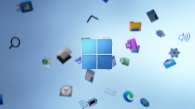 Logo de Windows 11 con un conjunto de herramientas flotando de fondo