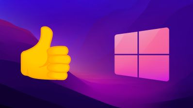Logotipo oficial de Windows 11 sobre un fondo abstracto de color morado, ilustrando las próximas novedades del sistema operativo.