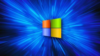 Logotipo de Windows XP con un fondo de vórtice azul oscuro