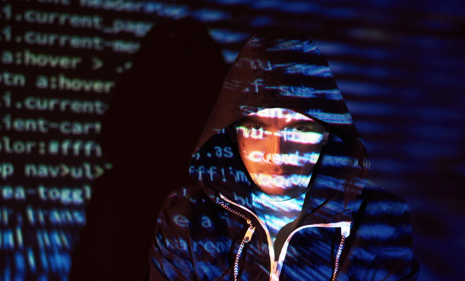 Ilustración conceptual de un hacker ético analizando código binario, en relación con la noticia sobre ciberseguridad y malware