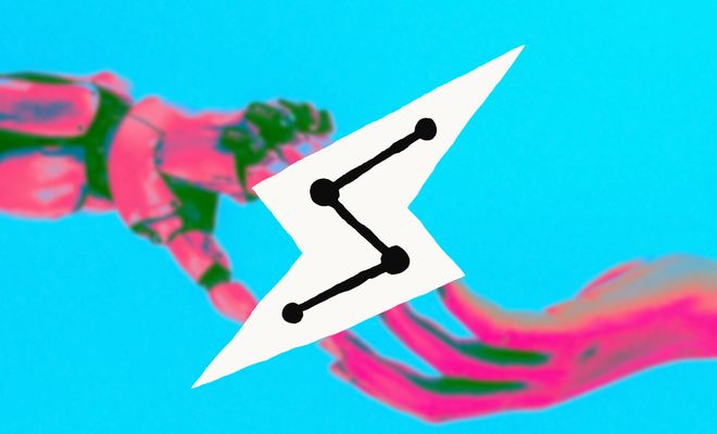 Imagen conceptual de Claude Cowork, con una mano humana y una robótica y el logotipo de la IA.