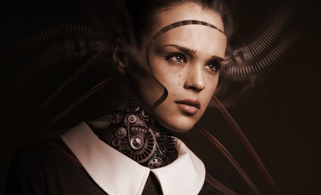 Robot con cara de mujer haciendo referencia a la IA.
