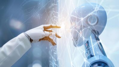 Una mano tocando el rostro de robot de IA.