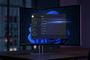 Monitor de escritorio que muestra el menú de Configuración de Windows 11 con un efecto de estela de luz sobre un fondo oscuro.