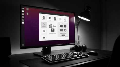 Interfaz de la sección Add-ons en el App Center de Ubuntu abierta en un monitor de escritorio en un entorno oscuro.